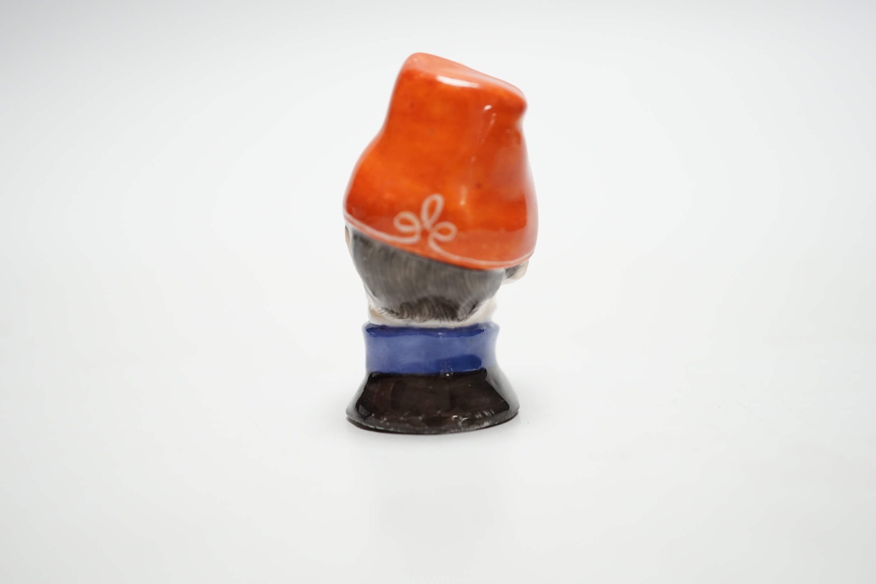 A Meissen bottle stopper or cane handle, modelled as a soldier’s head, 4.5cm